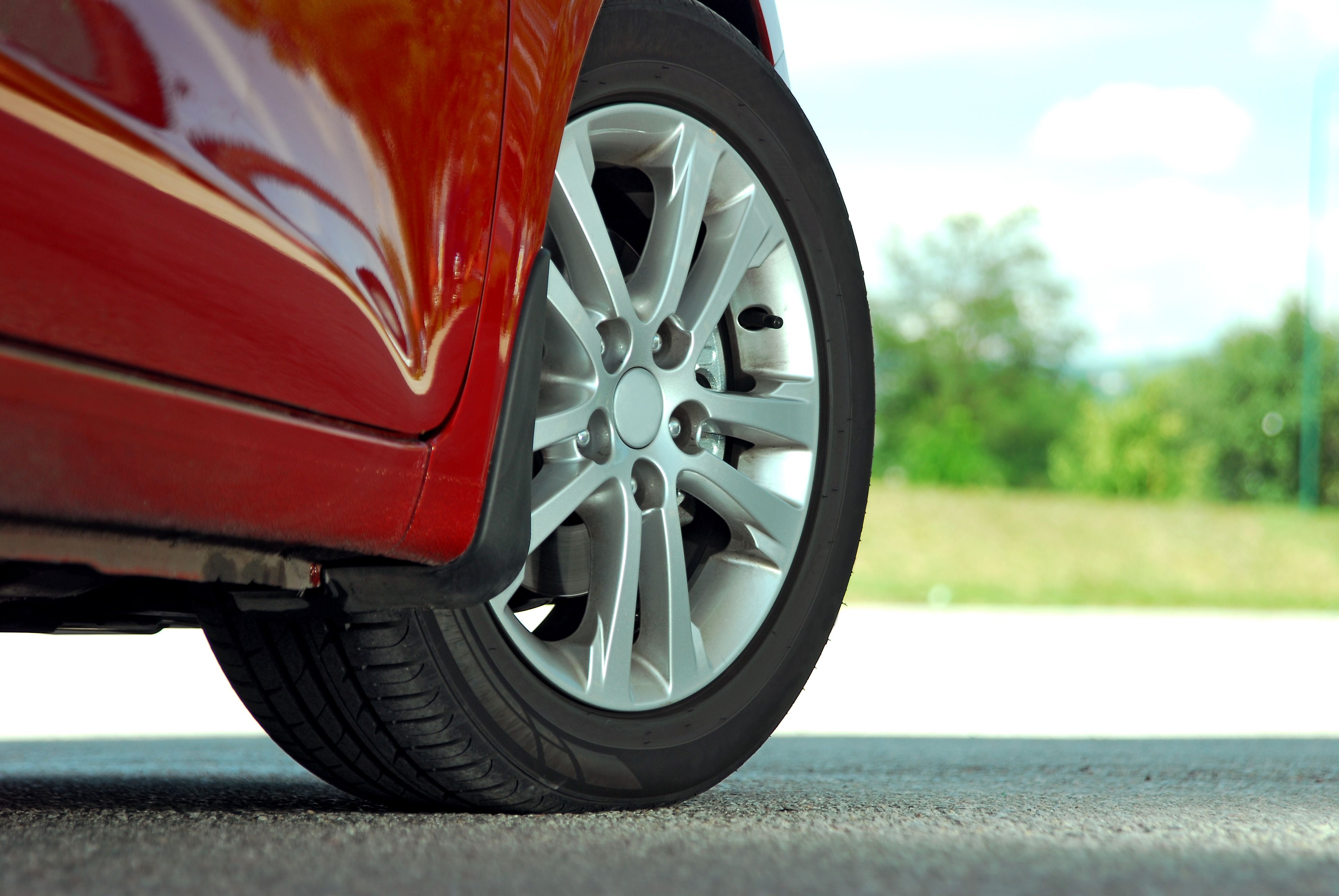 Close up of a car tire on the road