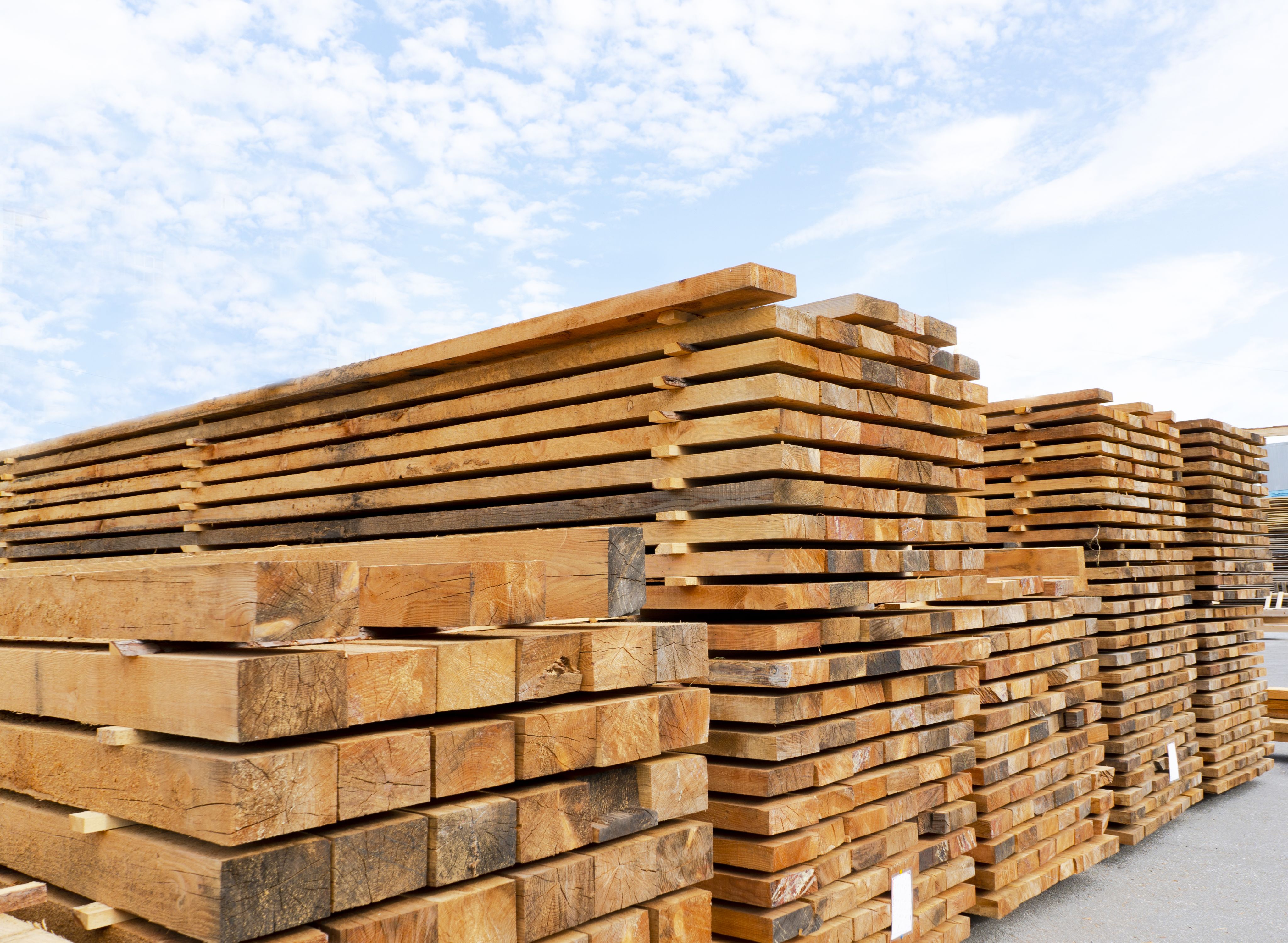 Lumber stacked in a yard