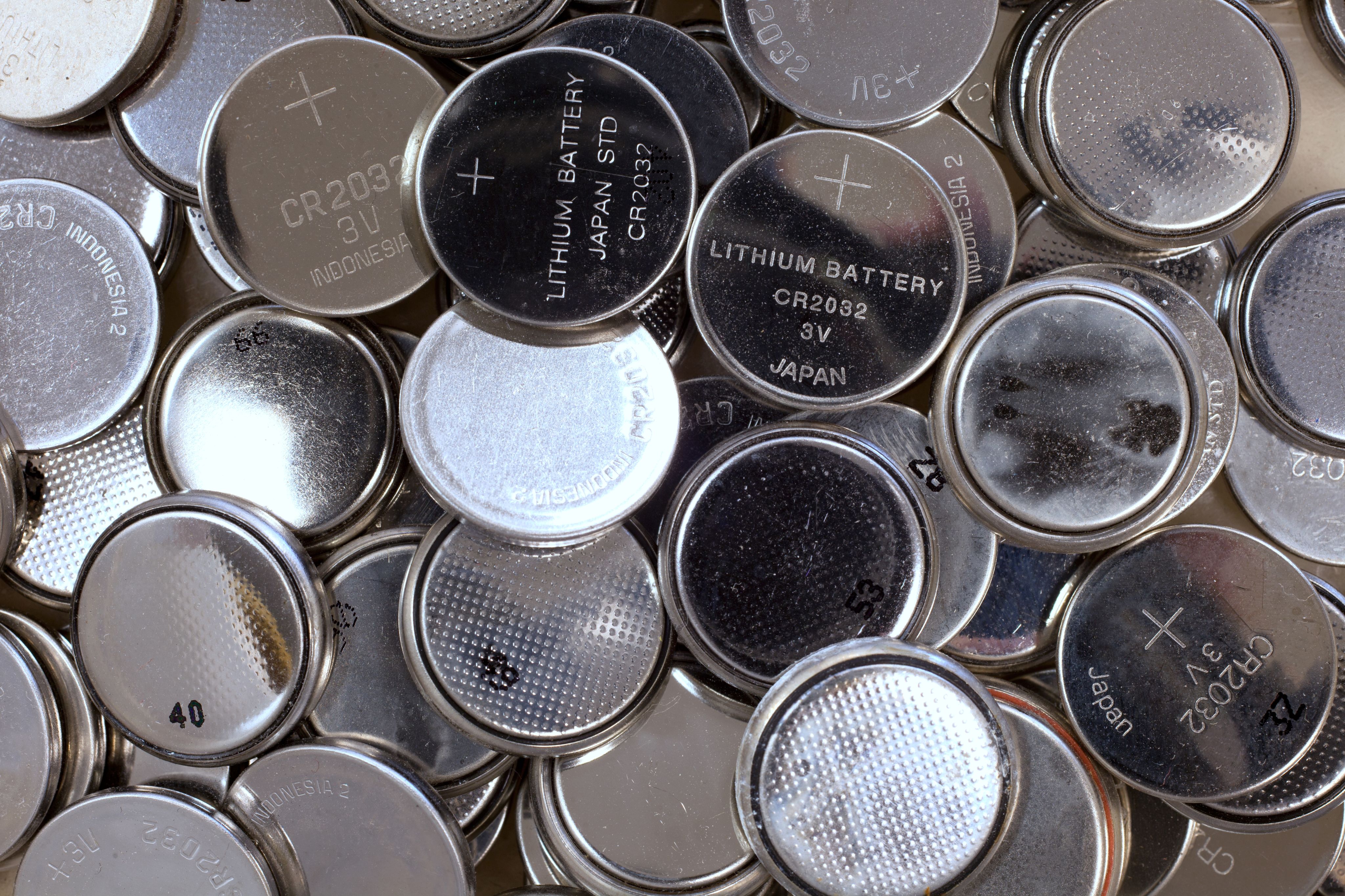 Disc shaped lithium ion batteries in a pile